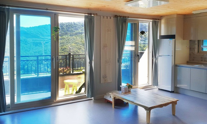 Yeosu House | Inviting Pyramid Red Clay Pension with Family-Friendly Amenities