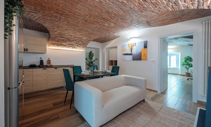 Turin Apartment | Elegant Quadrilatero Loft with Breakfast & Family Amenities
