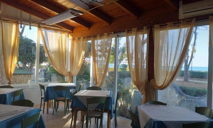 Pineto Bed & Breakfast | Family-Friendly Quadruple Room Steps from Pineto Beach