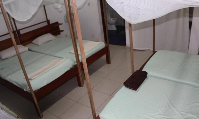 Antsiranana Hotel | Comfortable Quadruple Room with Private Bathroom for Families