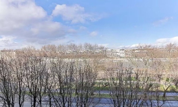 Quartier du Gros-Caillou Apartment | Quai d'Orsay: Modern Interiors with Scenic River Views