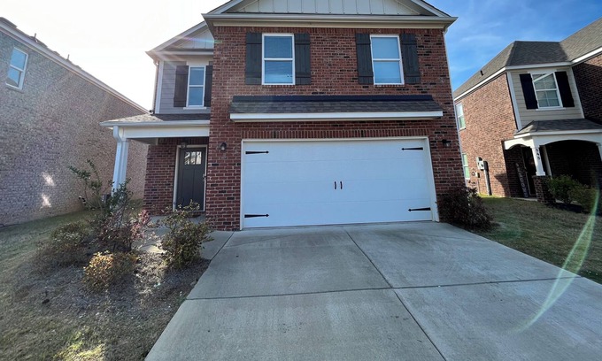 Fultondale House | Quaint 4-bedroom home with garage and driveway parking