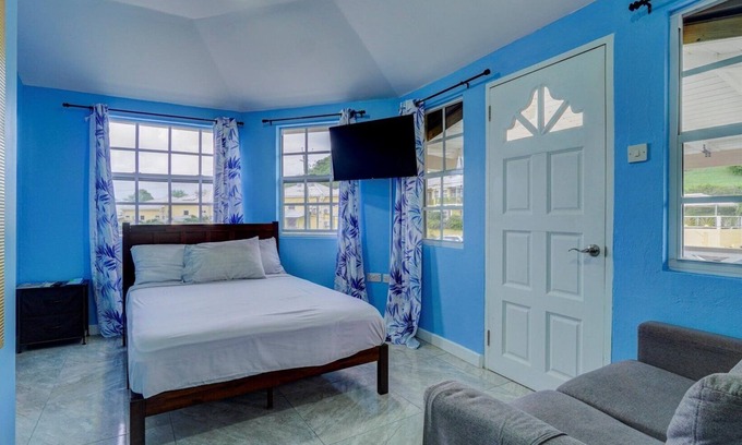 Calliste Apartment | Cozy Beachside Getaway with Kitchen and Breakfast Included