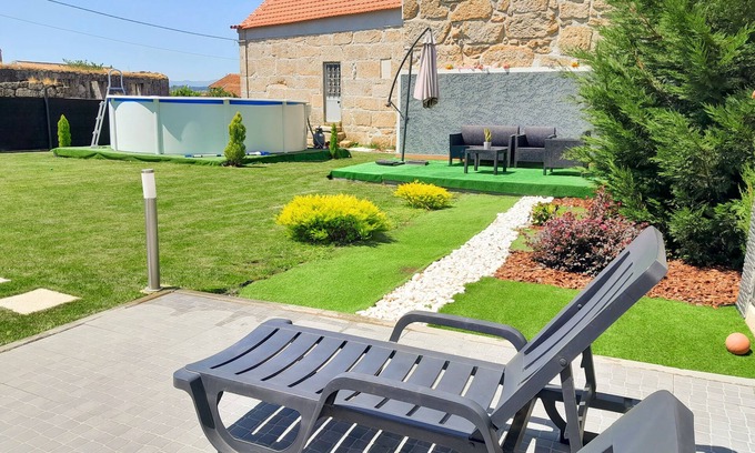 Nelas House | Relaxing Room with Hot Tub, Pool & Shared Garden Oasis