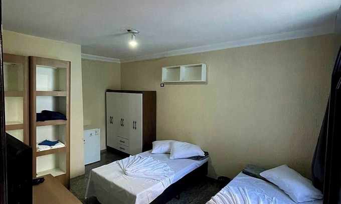 Liberdade Bed & Breakfast | Family Room 13: TV, Fridge & Breakfast Included