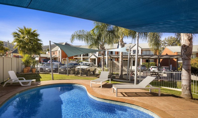 Tamworth Apartment | Unforgettable Quest Tamworth: Pool, Ocean Views & Breakfast