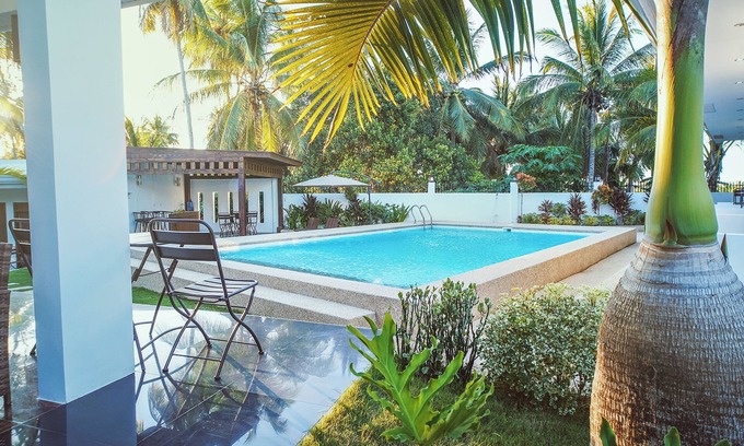Panglao Villa | Explore Quest Villa: Poolside Oasis with Ocean Views