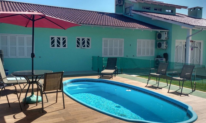 Ponta das Canas House | Relaxing Retreat with Pool, BBQ & Ocean View Steps Away