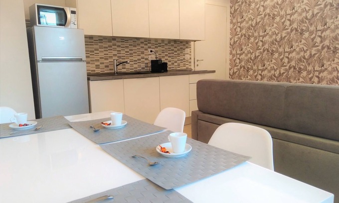 Cittadella Apartment | Serene Apartment Near Arena with Spa and Lake Views