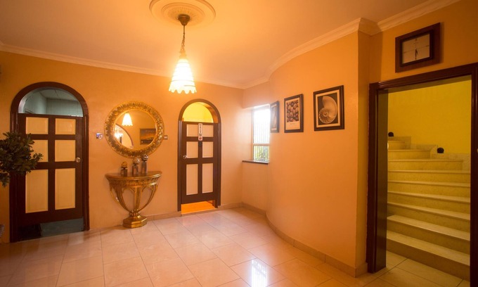 Ojodu House | Relax at Quiet Pools Inn with Spa and Family-Friendly Amenities