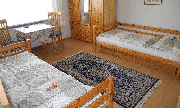 Schwanheim Apartment | Discover Peaceful Rooms in Frankfurt with Great Amenities