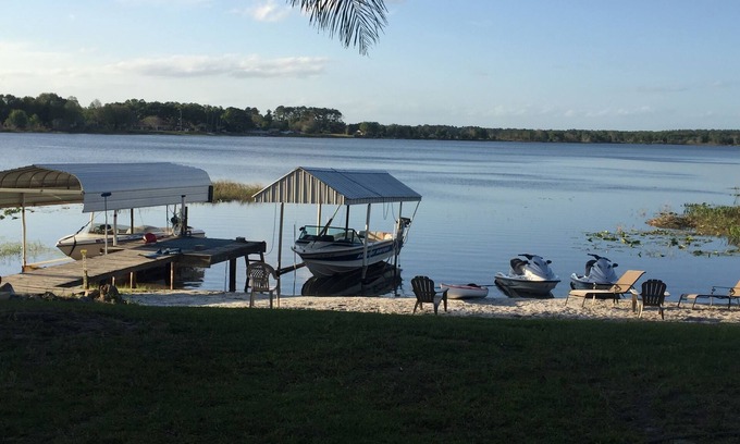 Candler House | Tranquil Lakefront Retreat with Pool and Ocean Views