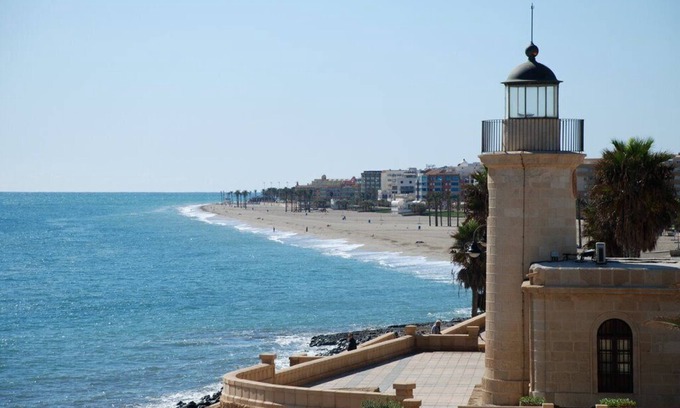 Roquetas de Mar Apartment | Cozy Apartment Steps from Beach with Pools & Ocean Views