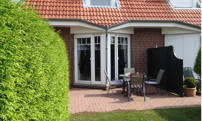 Dornumergrode House | Tranquil Holiday Home with Scenic Dike Views and Family Amenities