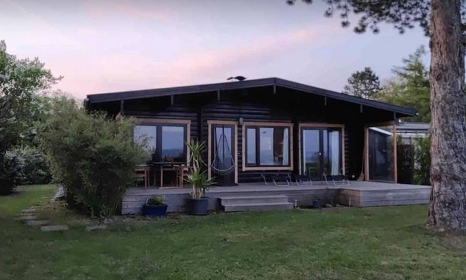 Starzach House | Serene Wooden Retreat with Ocean View and Family Amenities