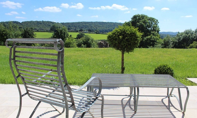Brimpsfield House | Idyllic 16th Century Cotswold Barn with Panoramic Views