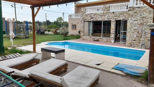 La Reja House | Tranquil Nature Retreat with Pool and Ocean Views
