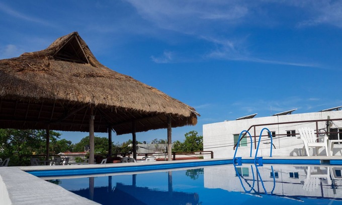 Colonia Centro Apartment | Top-Rated Quinta Suites: Relax by the Pool and Spa