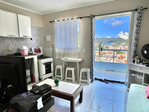 Praia dos Anjos House | Ocean View Retreat at Quitieenete Arraial do Cabo
