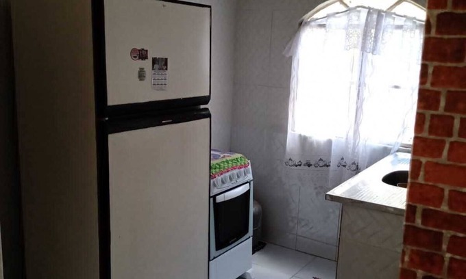 Araruama Apartment | Gaviao Lagoon Kitchenette: Oceanfront Family Retreat