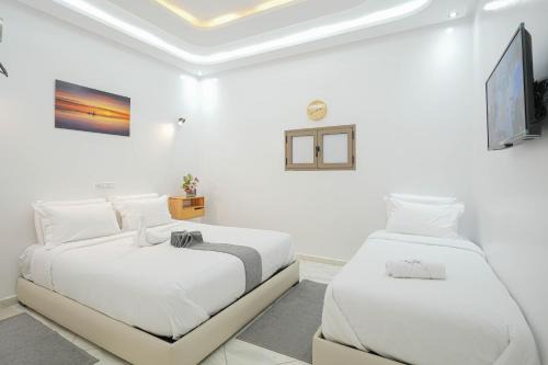 Dakhla Apartment | Discover Résidence America: 4-Star Retreat with Hot Tub