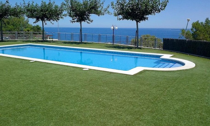 Llanca Apartment | Seaside Residence with Pool: Oceanfront Bliss Awaits