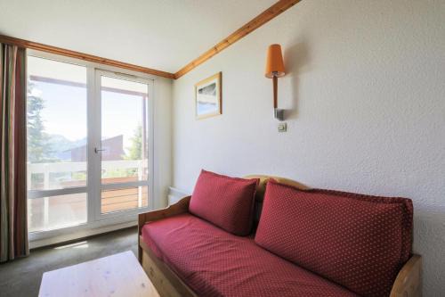 Eclose-Ouest Apartment | Explore Résidence Les Horizons d'Huez - Family-Friendly Retreat