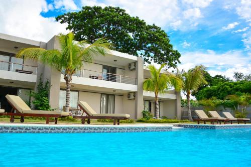 Pointe Aux Sables Apartment | Enjoy Oceanfront Comfort at Résidence Riva Bella