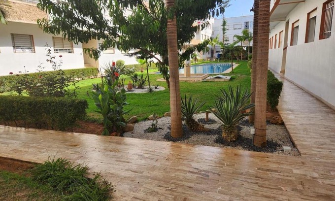 Harhoura Apartment | Experience Résidence Ryad Al Bahr: Pool & Beach Awaits
