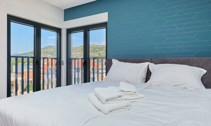 Babin Kuk Apartment | Modern R3 Double or Twin Room at DOMINIUM CITY SUITES
