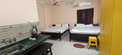 Puri Cabin | Family-Friendly Retreat at Radha Krishna Niwas Hotel