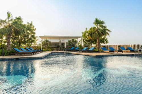 Dubai Hotel | Discover Radisson Dubai Damac Hills - Pet Friendly & Ocean View