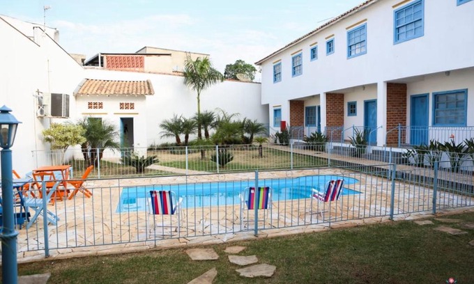 Perozinho Hotel | Discover Rafa's Pousada Encantos de Minas with Pool & Pets!