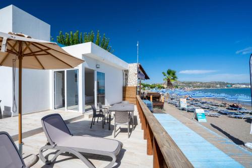 Faliraki Apartment | Oceanfront Raffaello Beach: Family-Friendly Retreat Awaits