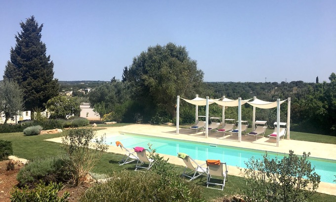 Ceglie Messapica House | Elegantly Set Retreat Amidst Olive Trees and Cacti
