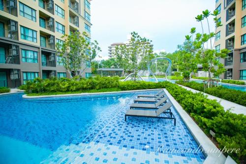 Cha-am Apartment | Discover Raincondo Ampere: Oceanfront Poolside Retreat