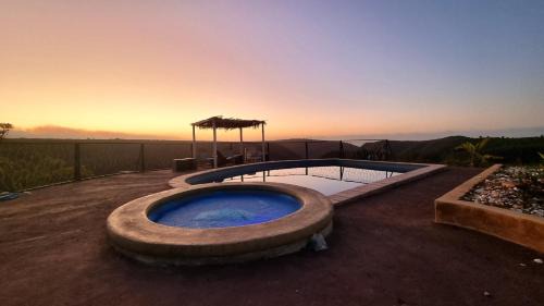 Die Barakke Cabin | Eco-Friendly Rainforest Ridge Resort with Oceanfront Views