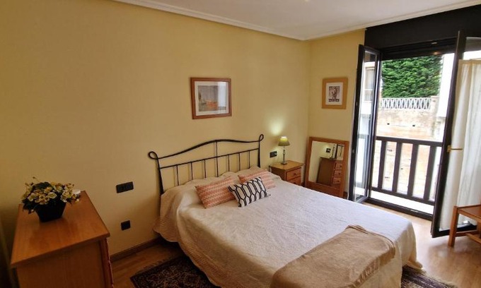 Colunga Apartment | Raitán 2 - Poolside Apartment for 4 with Pet-Friendly Perks