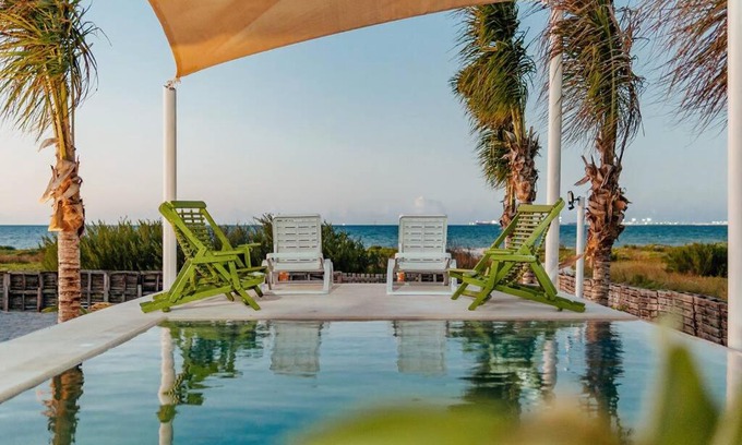 Progreso Municipality House | Beachfront Retreat at Rajulmar 336 with Ocean Views