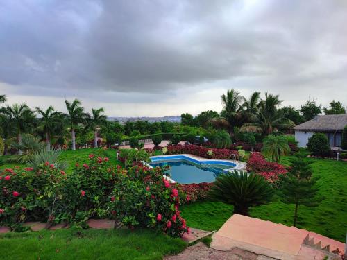 Bhuj House | Relax at Rajwada Farm Stay: Pet-Friendly Retreat with Pool