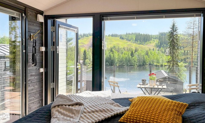 Kehys-Kainuu House | Discover Rakkaranta Cabin: Lake View & Spa Retreat