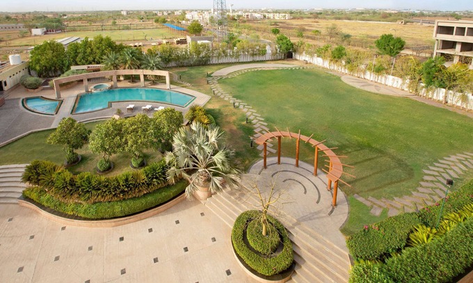 Village Hokra Hotel | Eco-Friendly Stay at Ramada by Wyndham Ajmer with Spa & Pool
