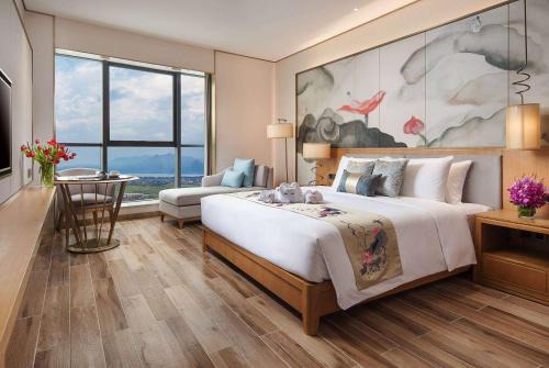 Chengjiang County Hotel | Experience Elegance at Ramada Plaza Fuxian Lake