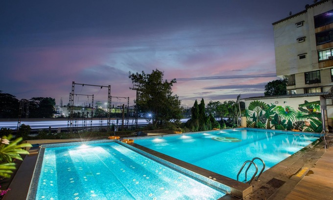 Khar Hotel | Welcome to Ramee Techome: Poolside Retreat with Kitchen