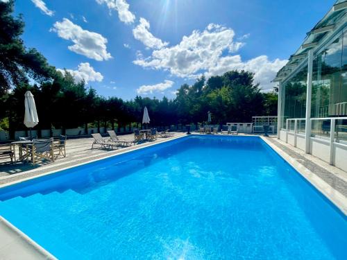 Anixi Villa | Experience Oceanfront Bliss at Ranch Ekru - 4-Star Getaway
