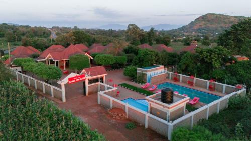 Mwanga Hotel | Relax at Randa Cottages Moshi with Pool & Dining Options