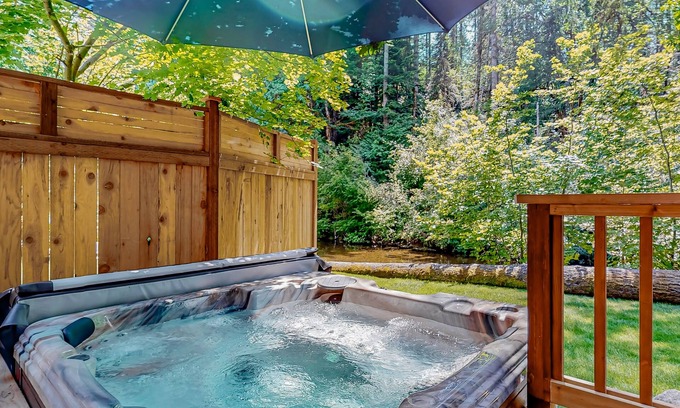 Mason County House | Dog-Friendly Riverfront Retreat with Hot Tub & Kayaks