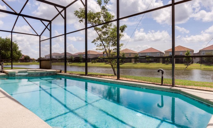 Veranda Palms House | Discover a Lakefront Oasis with Pool & Game Room