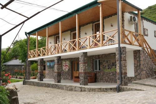 T'ba Hotel | Relax at Rati's Oda: Oceanfront Pool & Family-Friendly Stay