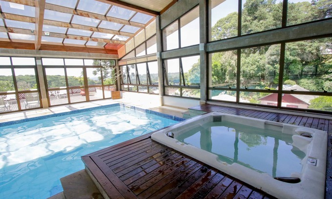 C A I C Hotel | Exceptional Raupp Flats Gramado: Pool, Spa & Family Friendly